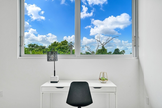 Imagen de la habitación del Hotel Design District Suites. Foto 4