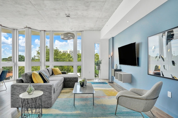 Imagen de la habitación del Hotel Design District Suites. Foto 6