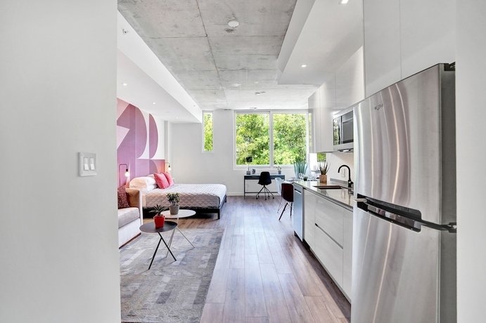 Imagen de la habitación del Hotel Design District Suites. Foto 9