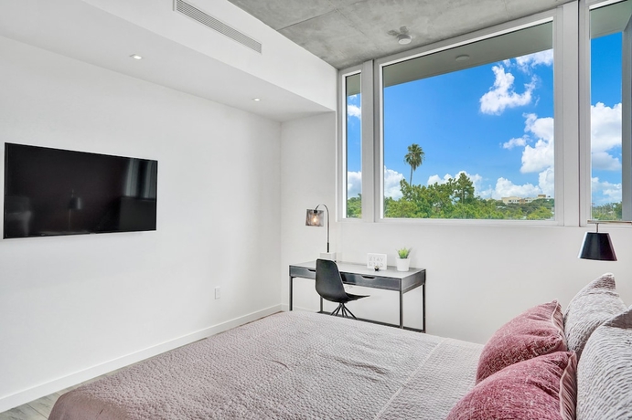 Imagen de la habitación del Hotel Design District Suites. Foto 16