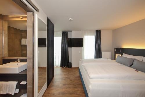 Imagen de la habitación del Hotel Design and Lifestyle Estilo. Foto 8