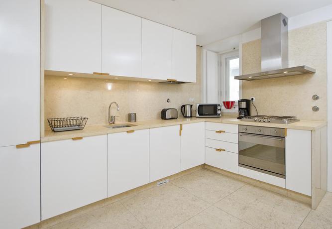 Imagen de la habitación del Hotel DesignChiadoFlats. Foto 3