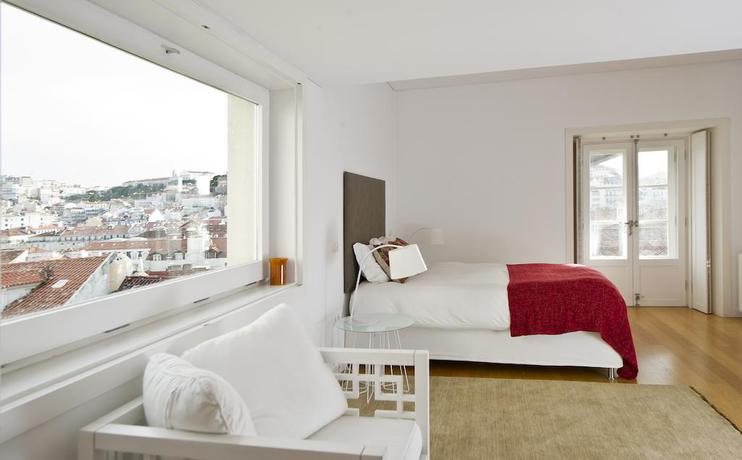 Imagen de la habitación del Hotel DesignChiadoFlats. Foto 6