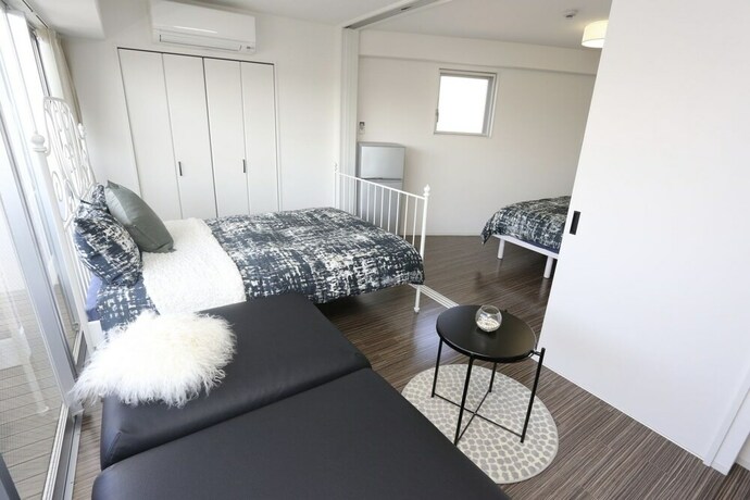 Imagen de la habitación del Hotel Designer Penthouse Nanba East. Foto 15
