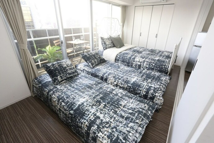 Imagen de la habitación del Hotel Designer Penthouse Nanba East. Foto 19