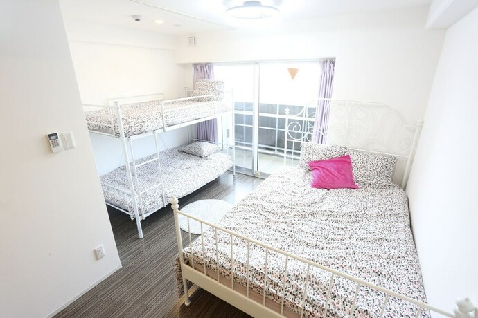 Imagen de la habitación del Hotel Designer Penthouse Nanba East. Foto 22
