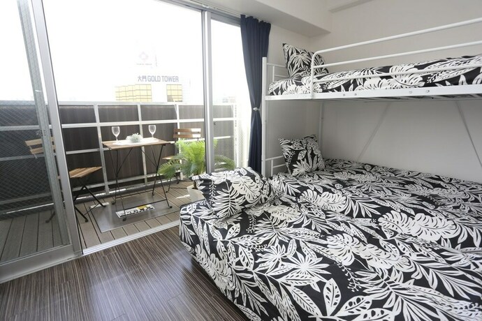 Imagen de la habitación del Hotel Designer Penthouse Nanba East. Foto 25