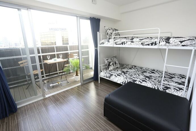 Imagen de la habitación del Hotel Designer Penthouse Nanba East. Foto 29