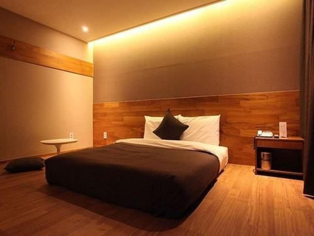 Imagen de la habitación del Hotel Designers Hotel The Rich. Foto 2