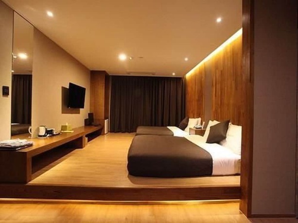Imagen de la habitación del Hotel Designers Hotel The Rich. Foto 3