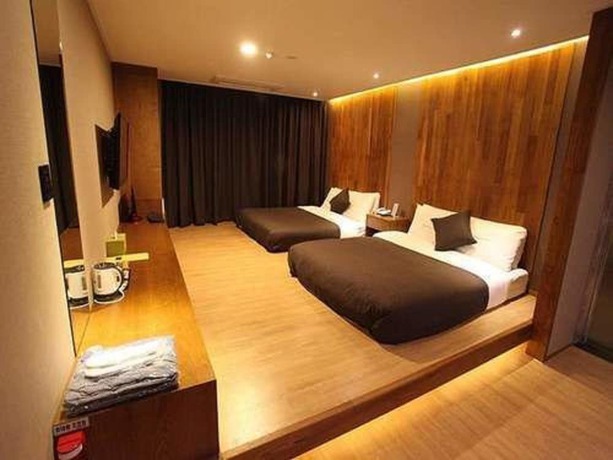Imagen de la habitación del Hotel Designers Hotel The Rich. Foto 9