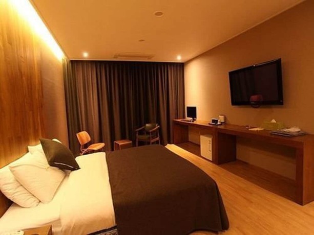 Imagen de la habitación del Hotel Designers Hotel The Rich. Foto 10