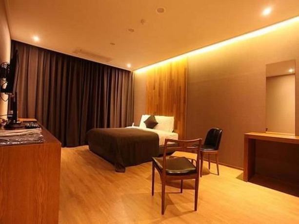 Imagen de la habitación del Hotel Designers Hotel The Rich. Foto 12