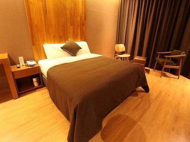 Imagen de la habitación del Hotel Designers Hotel The Rich. Foto 13