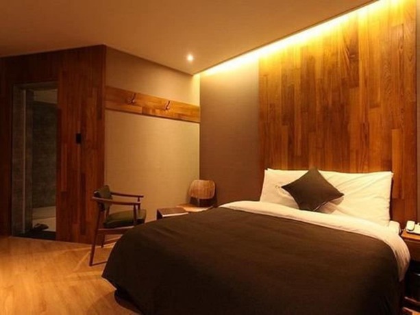 Imagen de la habitación del Hotel Designers Hotel The Rich. Foto 16