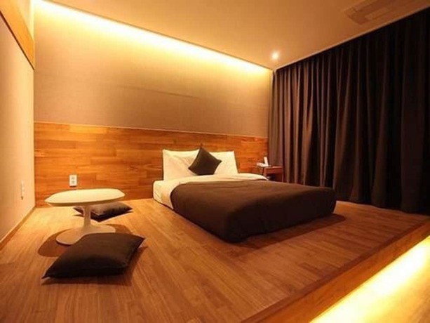 Imagen de la habitación del Hotel Designers Hotel The Rich. Foto 17