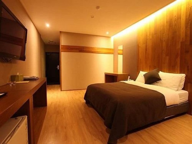 Imagen de la habitación del Hotel Designers Hotel The Rich. Foto 18