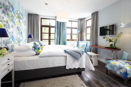 Imagen de la habitación del Hotel Designhotel F&auml;hrhaus Mei&szlig;en. Foto 7