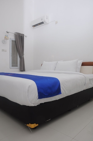 Imagen de la habitación del Hotel Desiring Homestay Banjarmasin. Foto 10