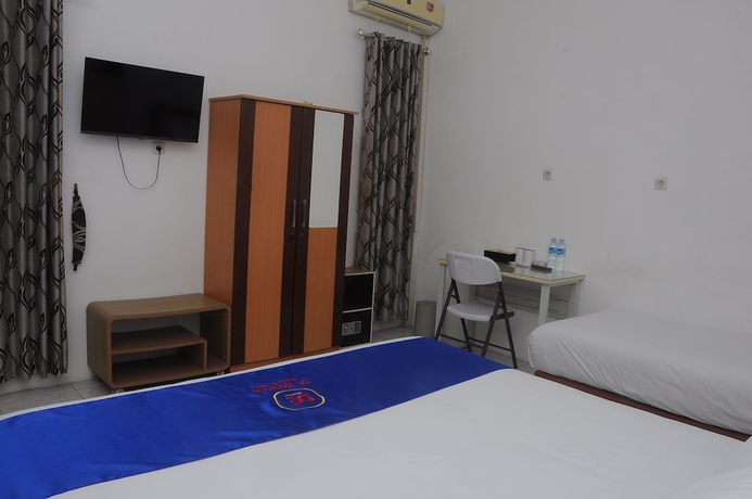 Imagen de la habitación del Hotel Desiring Homestay Banjarmasin. Foto 12