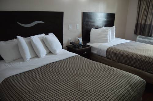 Imagen de la habitación del Hotel Destin Inn and Suites. Foto 15