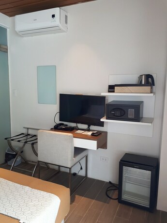 Imagen de la habitación del Hotel Destino Beach Club Dive Resort And Hotel. Foto 20