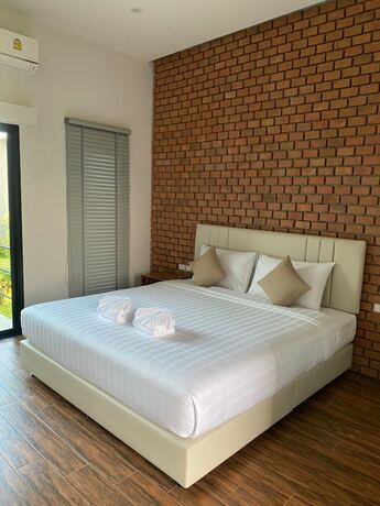 Imagen de la habitación del Hotel Destino Surin. Foto 20