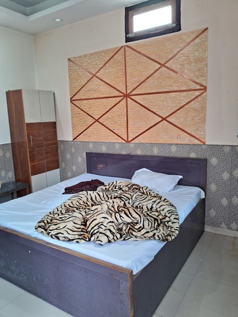 Imagen de la habitación del Hotel Dev Aagmann Inn. Foto 1