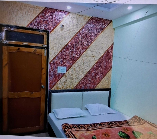 Imagen de la habitación del Hotel Dev Aagmann Inn. Foto 3