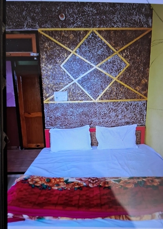 Imagen de la habitación del Hotel Dev Aagmann Inn. Foto 7