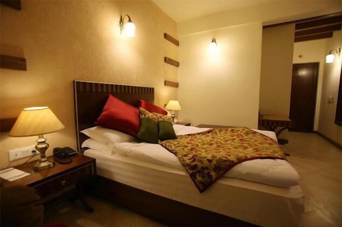 Imagen de la habitación del Hotel Dev Cottage. Foto 10