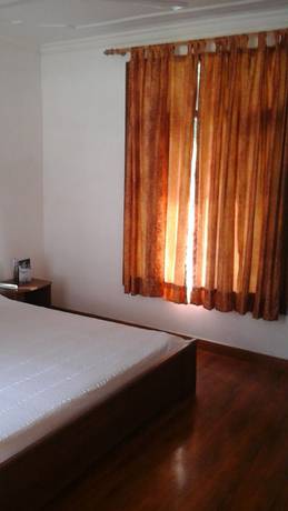 Imagen de la habitación del Hotel Dev Cottage. Foto 15