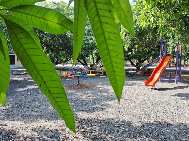 Imagen de los exteriores del Hotel Dev Farm Sasan Gir. Foto 17