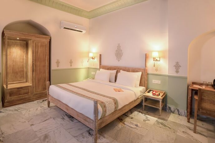 Imagen de la habitación del Hotel Dev Mahal - A Boutique Heritage. Foto 15