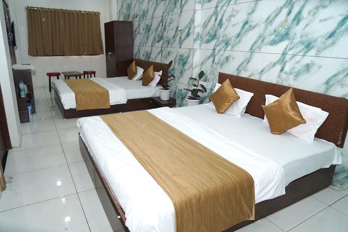 Imagen de la habitación del Hotel Dev Shree Palace, Ujjain. Foto 2