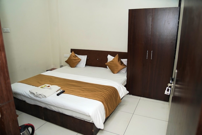 Imagen de la habitación del Hotel Dev Shree Palace, Ujjain. Foto 5