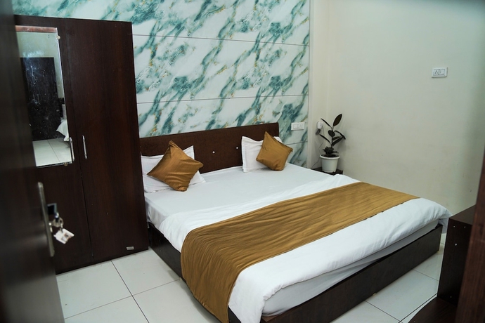 Imagen de la habitación del Hotel Dev Shree Palace, Ujjain. Foto 6
