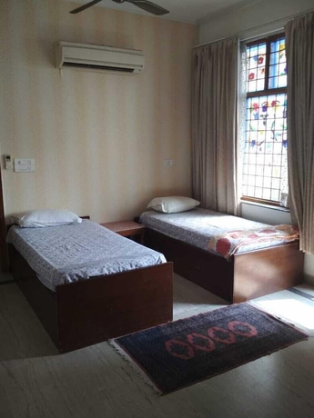 Imagen de la habitación del Hotel Dev Vatika Home Stay. Foto 9