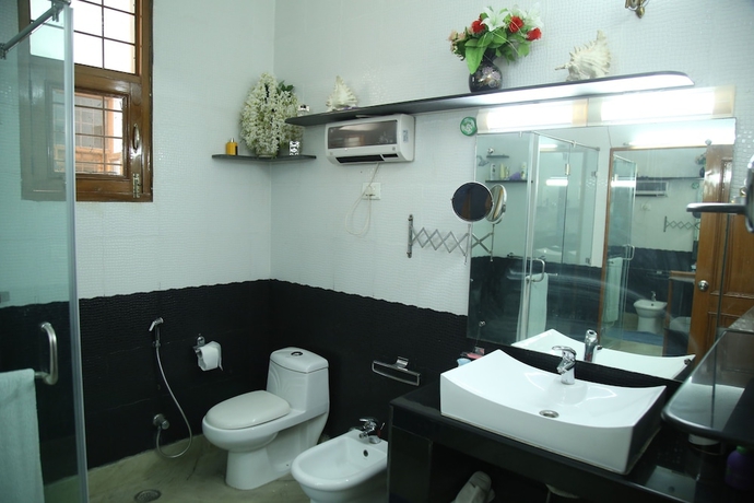 Imagen de la habitación del Hotel Dev Vatika Home Stay. Foto 10
