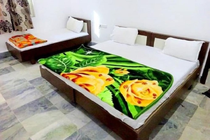 Imagen de la habitación del Hotel Dev Villa. Foto 17