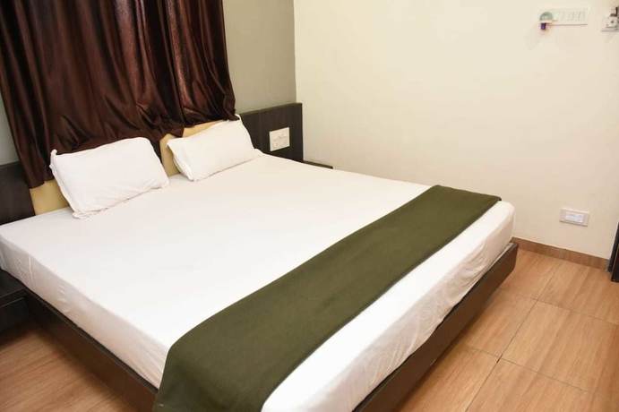 Imagen de la habitación del Hotel Devang. Foto 10