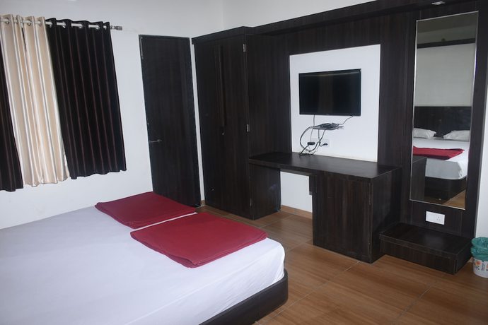 Imagen de la habitación del Hotel Devang. Foto 14