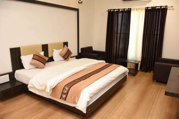 Imagen de la habitación del Hotel Devang. Foto 17