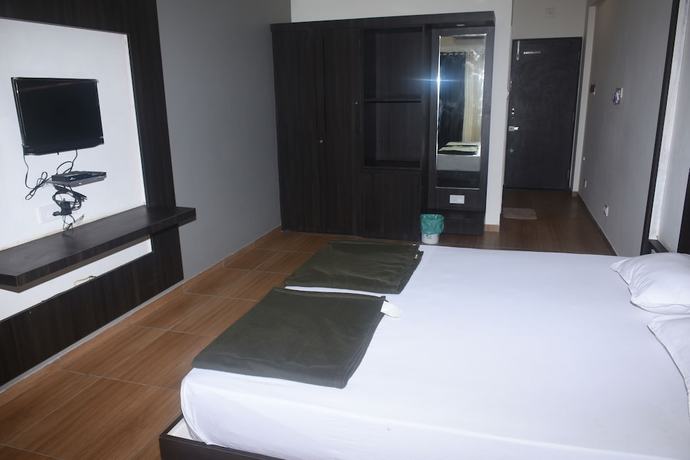 Imagen de la habitación del Hotel Devang. Foto 18