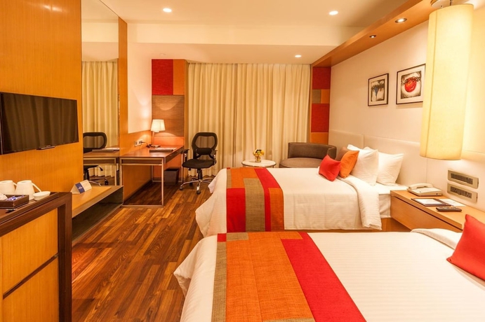 Imagen de la habitación del Hotel Deventure Sarovar Portico Kapashera, New Delhi. Foto 9