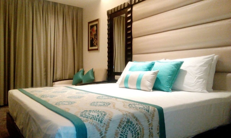 Imagen de la habitación del Hotel Deventure Sarovar Portico Kapashera, New Delhi. Foto 10