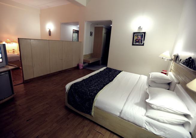 Imagen de la habitación del Hotel Devi Grand. Foto 14