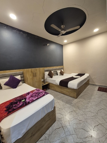 Imagen de la habitación del Hotel Devi Residency. Foto 2