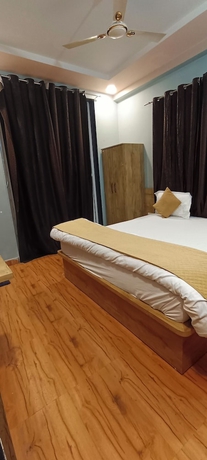 Imagen de la habitación del Hotel Devi Residency. Foto 12