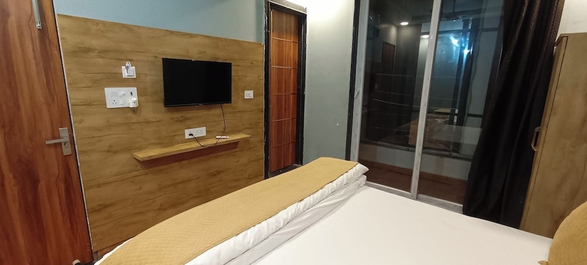 Imagen de la habitación del Hotel Devi Residency. Foto 14